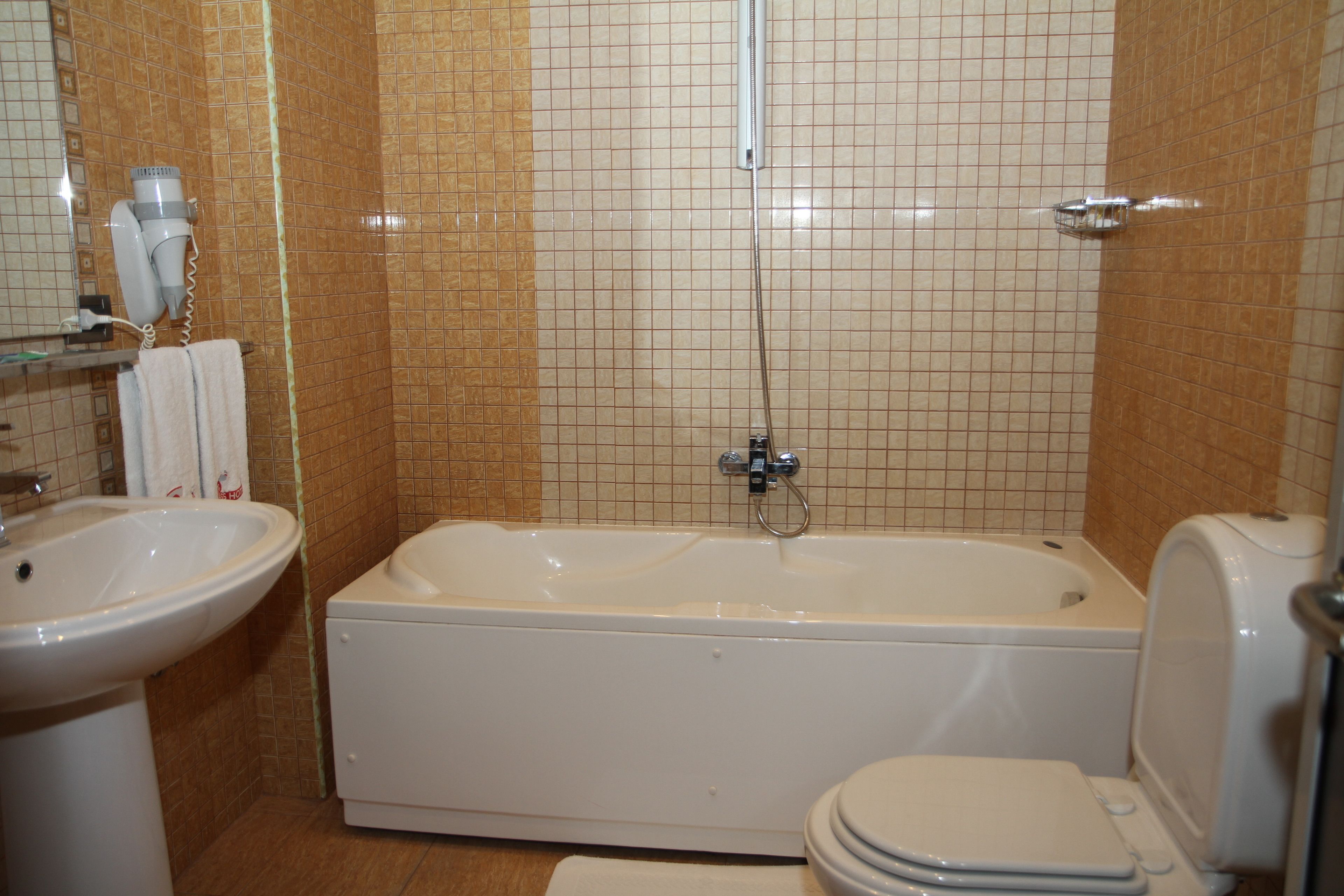 free toiletries, hair dryer, slippers, towels