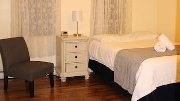 Business Condo, 1 Bedroom | 1 bedroom, desk, iron/ironing board, free WiFi