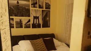 Condo empresarial, 1 habitación | Área de sala de estar | Televisión de pantalla plana