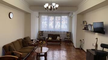 Family Apartment | Living area | Flat-screen TV