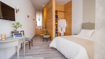 Ropa de cama de alta calidad, minibar, caja fuerte y escritorio