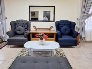 Junior Villa, 2 Bedrooms, Garden View | Living area | TV - Villa Kota Bunga Anggrek (Cipanas)