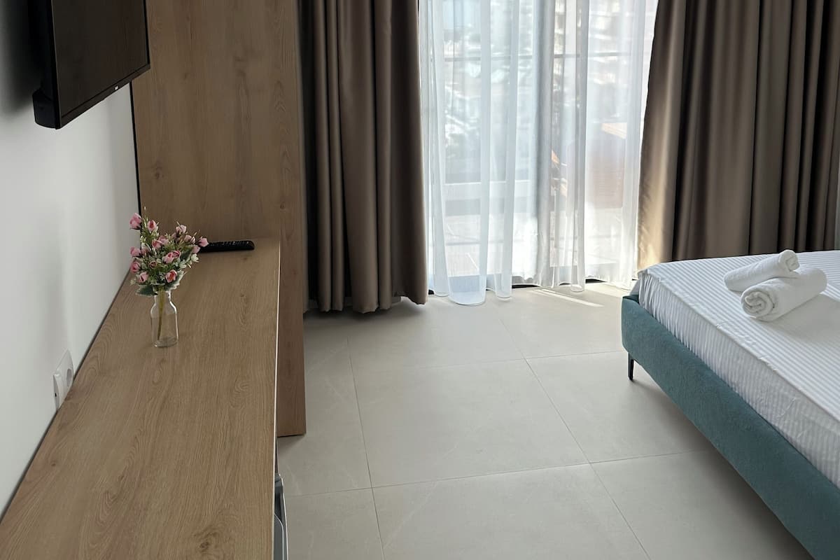 Deluxe tweepersoonskamer, uitzicht op zee | 1 slaapkamer, geluiddichte muren, gratis wifi