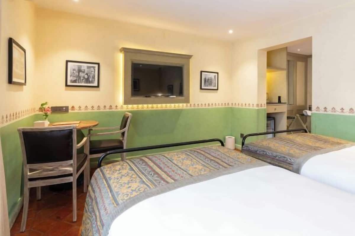 Premium bedding, pillowtop beds, minibar, in-room safe