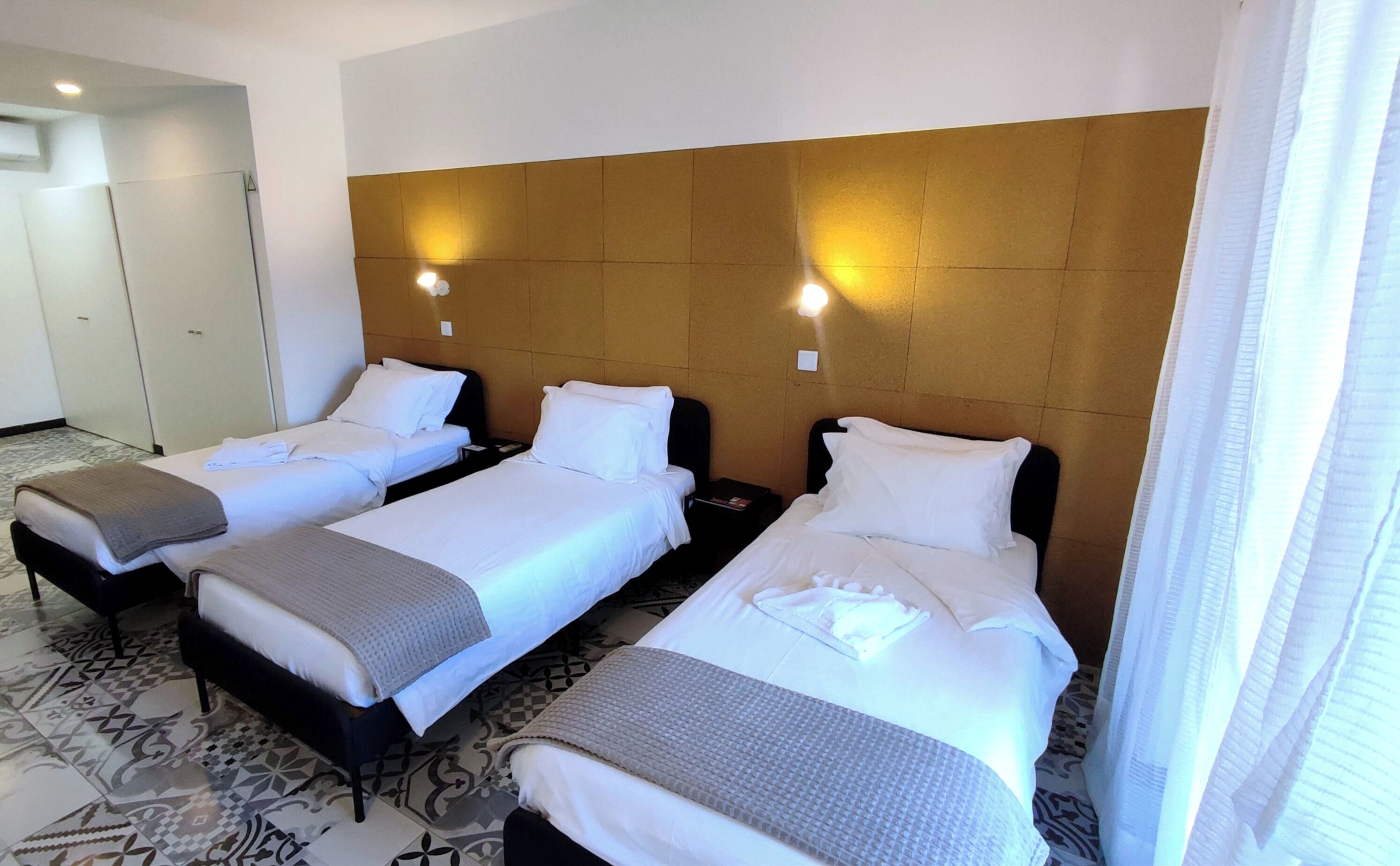 Blackout curtains, iron/ironing board, free WiFi, bed sheets