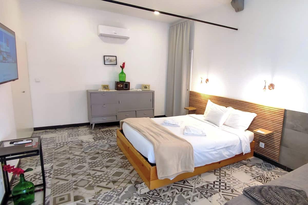 Blackout curtains, iron/ironing board, free WiFi, bed sheets