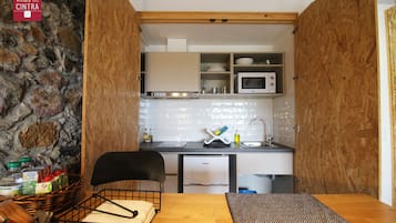 Studio, 2 Bedrooms | Private kitchen | Fridge, microwave, coffee/tea maker