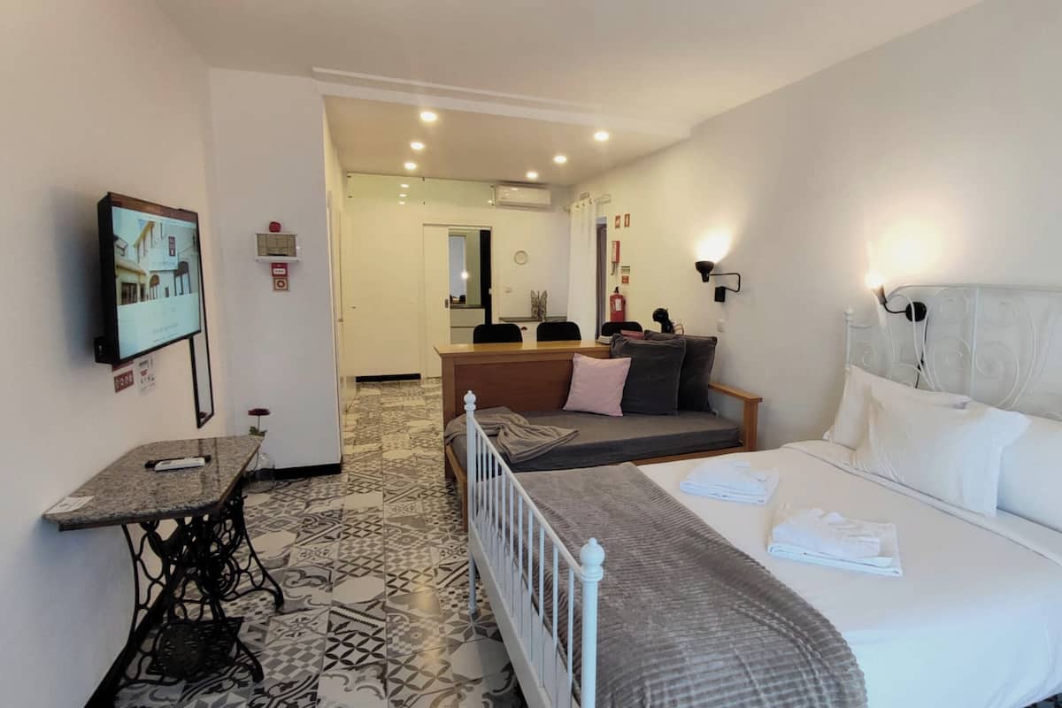 Blackout curtains, iron/ironing board, free WiFi, bed sheets