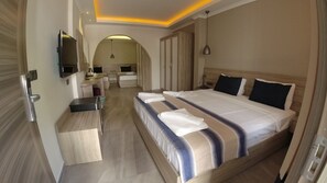 Basic Quadruple Room | Premium bedding, memory foam beds, minibar, in-room safe - Seyir Village Hotel (Fethiye)