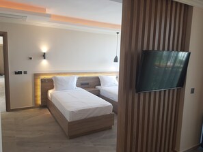Deluxe Quadruple Room | Premium bedding, memory-foam beds, minibar, in-room safe - Seyir Village Hotel (Fethiye)