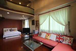 高級四人房, 庭園景觀 (A) | 遮光布/窗簾、隔音、免費無線上網、床單