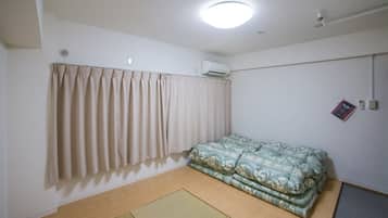 Basic Triple Room, Non Smoking | Down comforters, blackout drapes, free WiFi, bed sheets