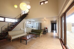 Family Townhome, 2 Bedrooms (Mi-ni - 1 queen and 2 futons) | Living area | Flat-screen TV, fireplace, heated floors - Baettorong Jinni (Jeju City)