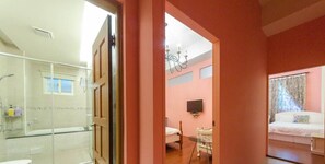 A hotel room with a shower, a bed, a TV, and a small table. - Hualien 5FM Homestay - Xinyi (Hualien City)