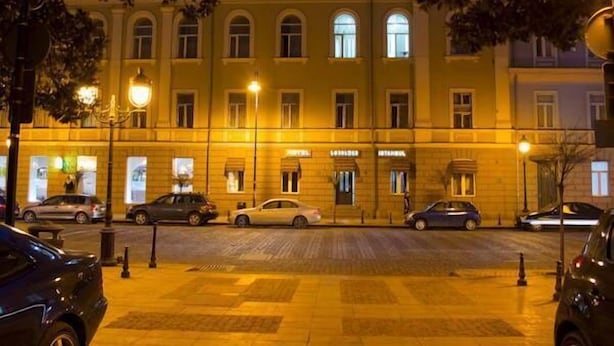A hotel facade with multiple windows and a ground floor entrance. - Istanbul Hotel (Tbilisi)