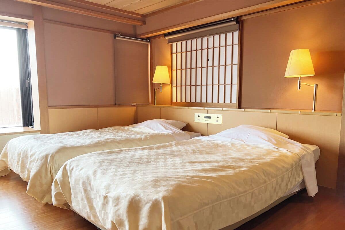 Disability-Access Twin Room with Open Air Bath - Non-Smoking | In-room safe, desk, bed sheets