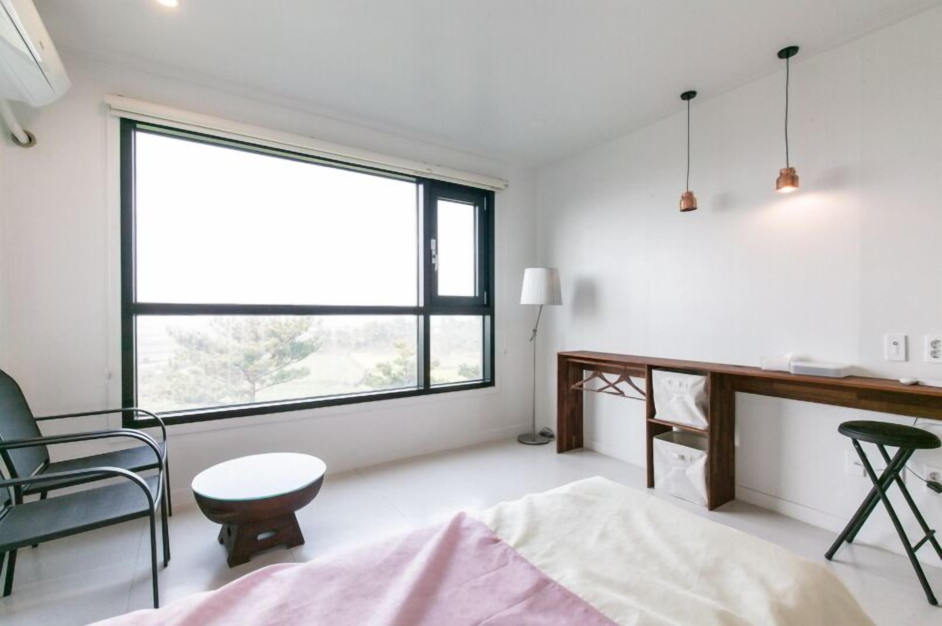 Quarto duplo | Área de estar | TV de tela plana