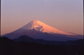A snow-capped mountain with a clear sky. - Ohito Hotel (Izunokuni)