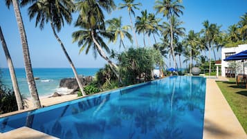 Outdoor pool, pool umbrellas, pool loungers