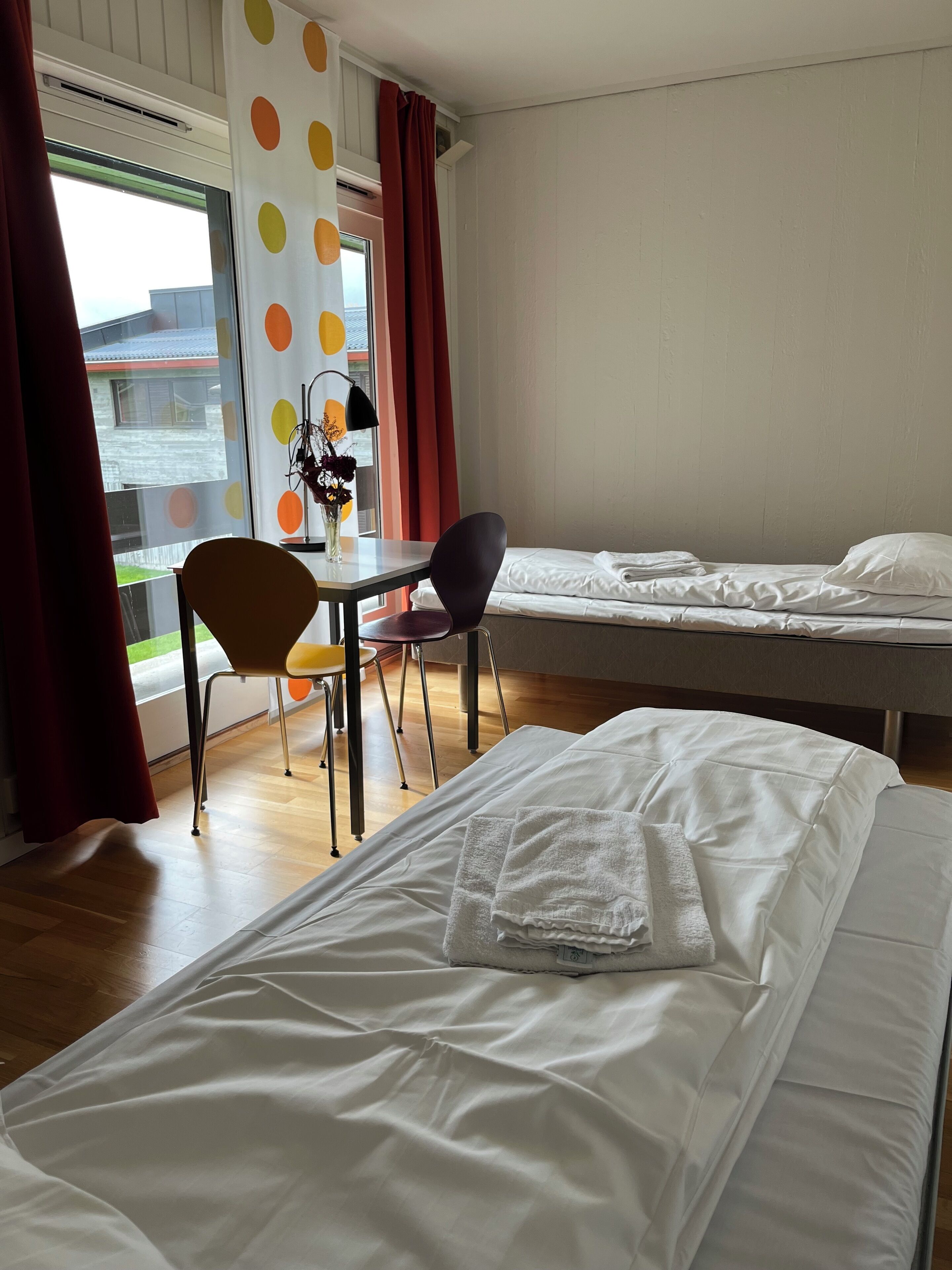 twin room | hypo-allergenic bedding, desk, blackout curtains, iron/ironing board