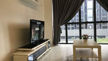 Family Apartment, 2 Bedrooms, Garden View | Living room | Flat-screen TV
