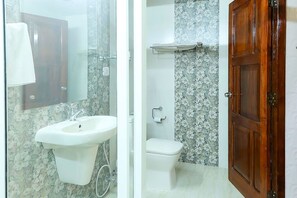 Standard Double Room, 1 Double Bed | Bathroom | Shower, hair dryer, towels, soap - Chiramel Residency (Kochi)