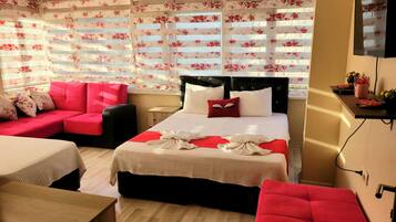 Desk, laptop workspace, free WiFi, bed sheets