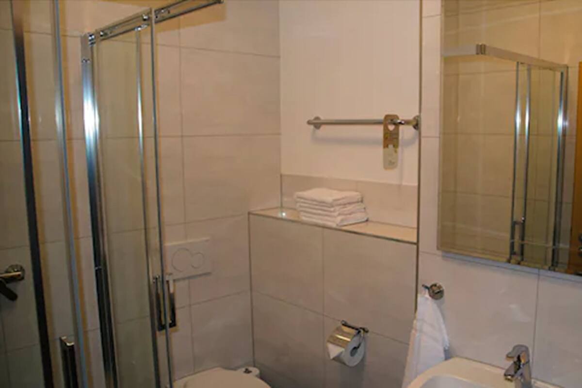 Shower, free toiletries, hair dryer, towels