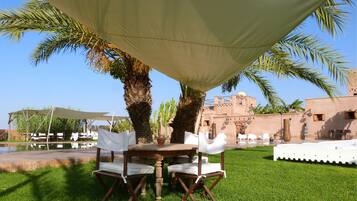 Breakfast, lunch, dinner served; international cuisine, pool views