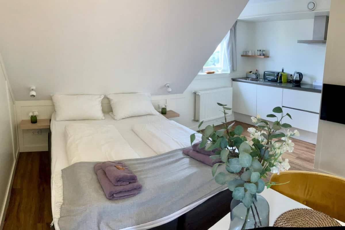 Apartament Deluxe, al costat de la muntanya | 1 dormitori, roba de llit d'alta qualitat i caixa forta a l'habitació