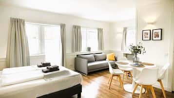 Premium bedding, in-room safe, laptop workspace, soundproofing