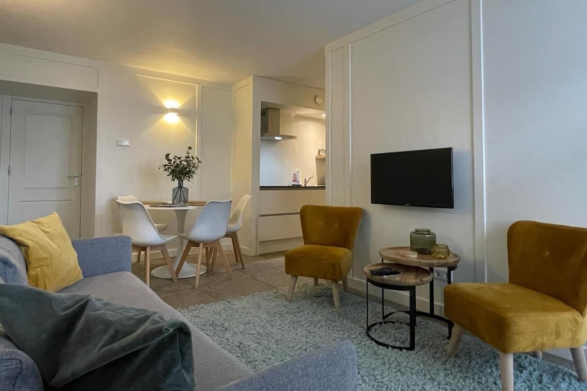 Apartament Deluxe, 1 dormitori, pati | 1 dormitori, roba de llit d'alta qualitat i caixa forta a l'habitació