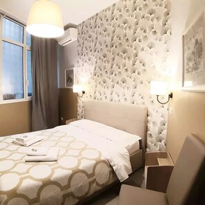 Habitación doble estándar | Ropa de cama de alta calidad y minibar