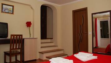 Suite, 2 Bedrooms | Iron/ironing board, rollaway beds, free WiFi, bed sheets