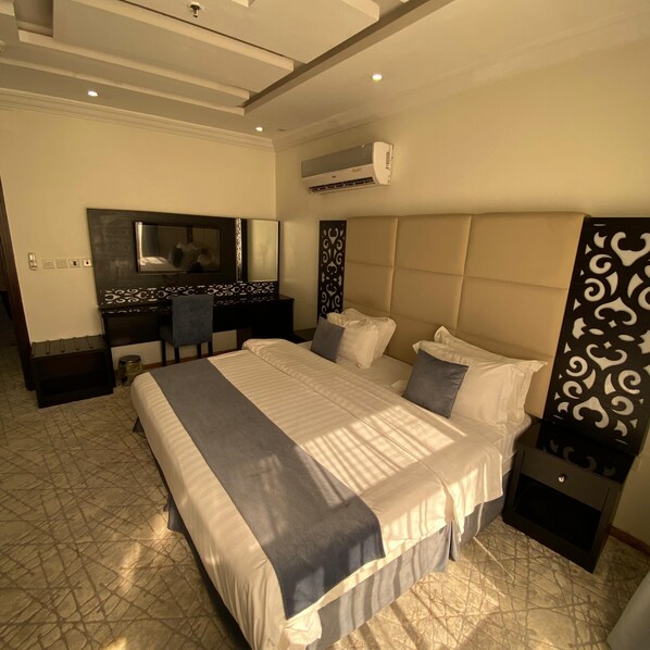 Premium bedding, pillowtop beds, in-room safe, blackout drapes