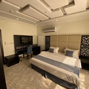 Premium bedding, pillowtop beds, in-room safe, blackout drapes