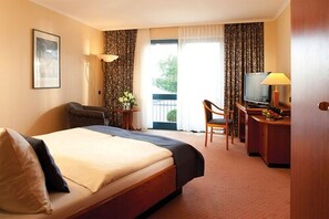 Literie hypoallergénique, minibar, coffres-forts dans les chambres