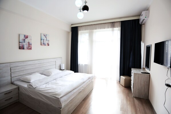 Premium bedding, blackout drapes, iron/ironing board, free WiFi