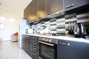 都會公寓, 3 間臥室, 城市景 | 私人廚房 | 雪櫃、微波爐、咖啡機/沖茶器