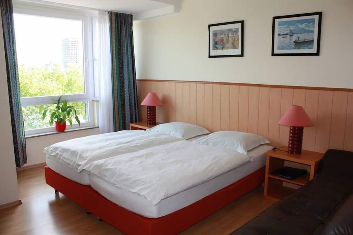 Twin Room | Iron/ironing board, free cribs/infant beds, free WiFi, bed sheets
