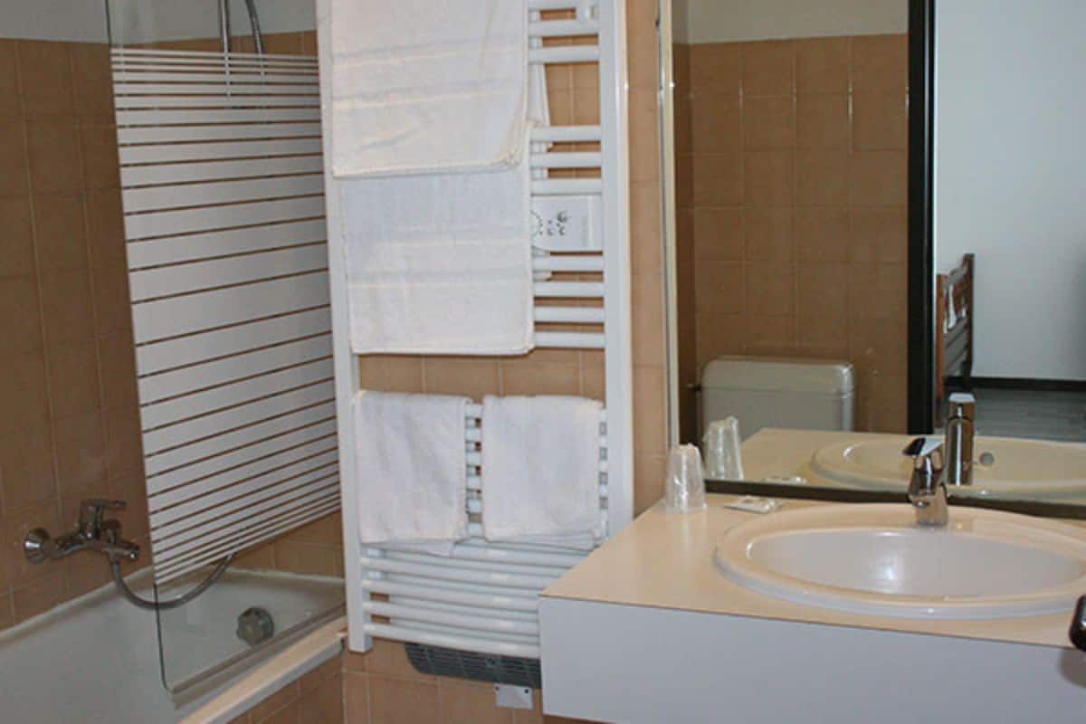 standard double room | bathroom | hair dryer, towels