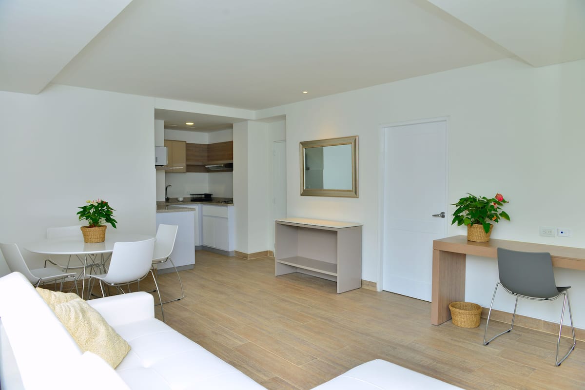 suite, park view | living room | 45-inch tv with cable channels, pay films