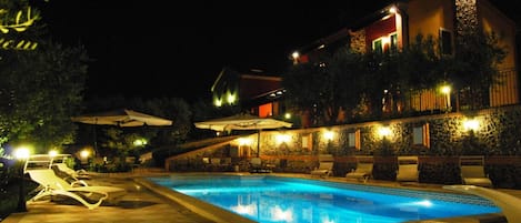 Outdoor pool, open 8:30 AM to 8:30 PM, pool loungers