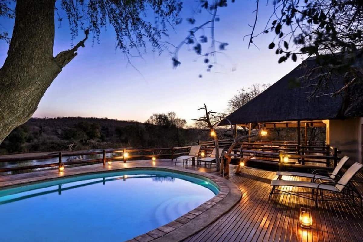 Exclusive Villa | Living area | Flat-screen TV