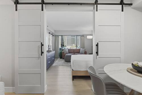 One Bedroom Fountain View | Individually decorated, individually furnished, blackout drapes
