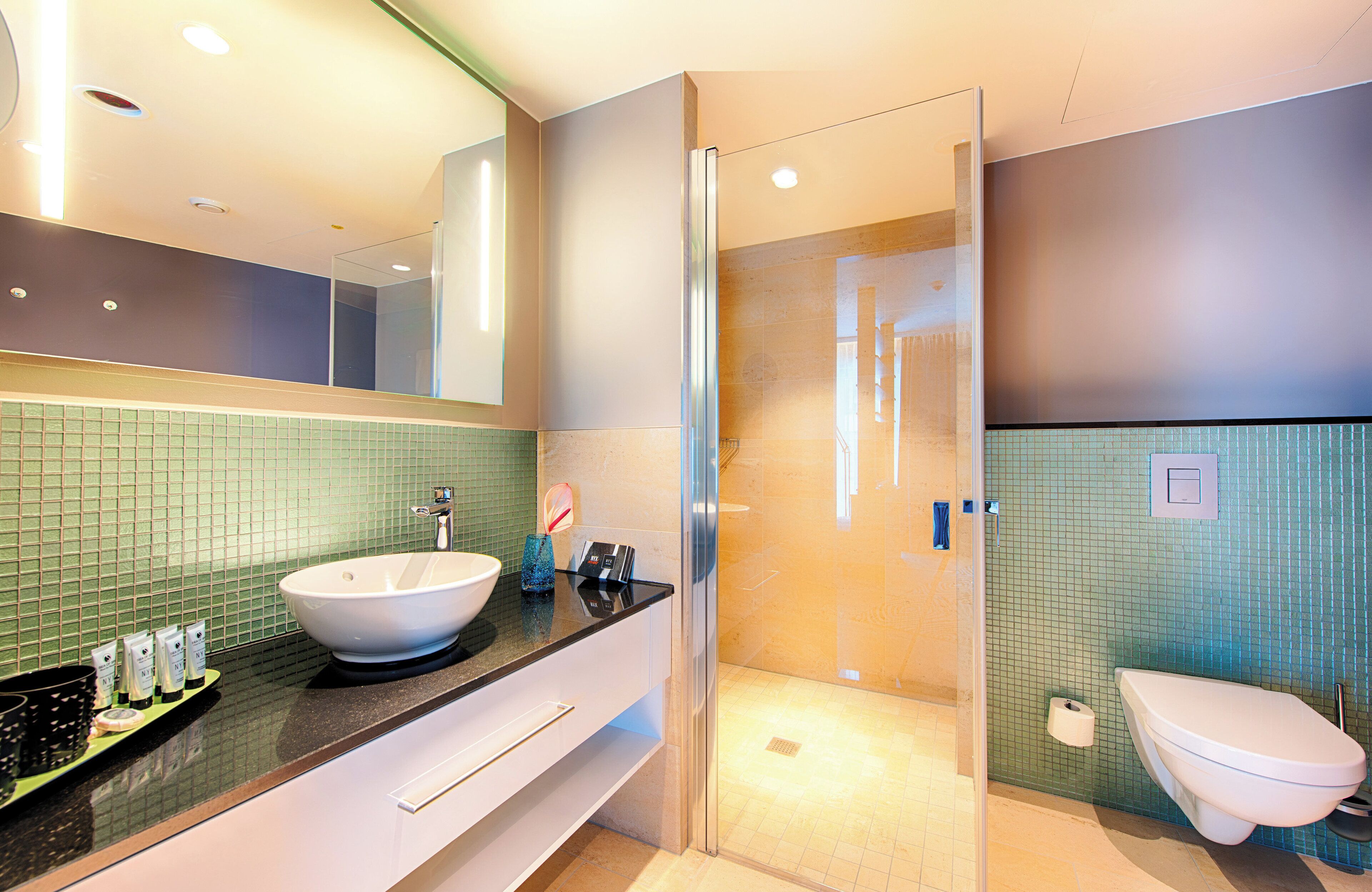 superior room | bathroom | shower, designer toiletries, hair dryer, towels