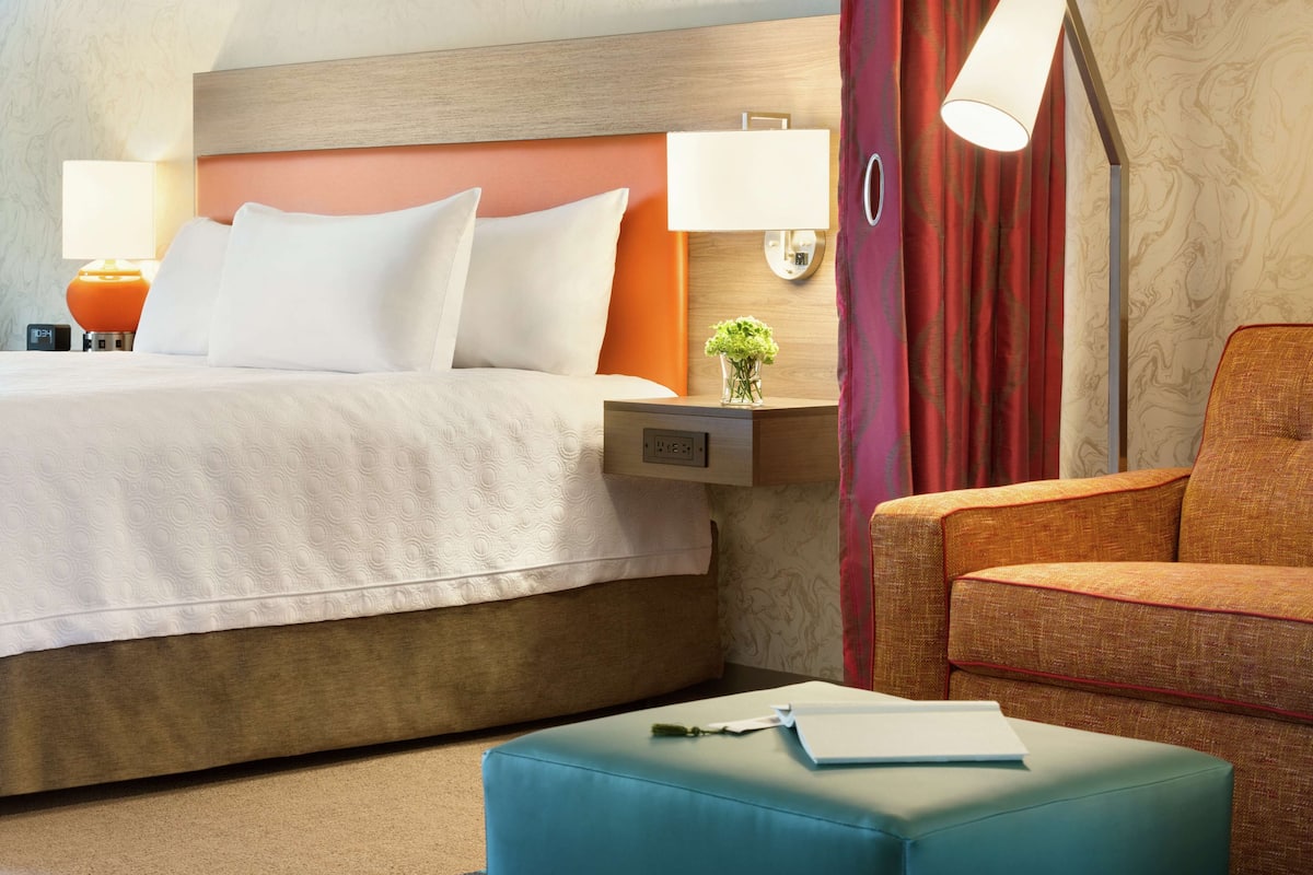 Studio, 1 King Bed, Accessible, Bathtub | Living area | 42-inch LCD TV with satellite channels, TV