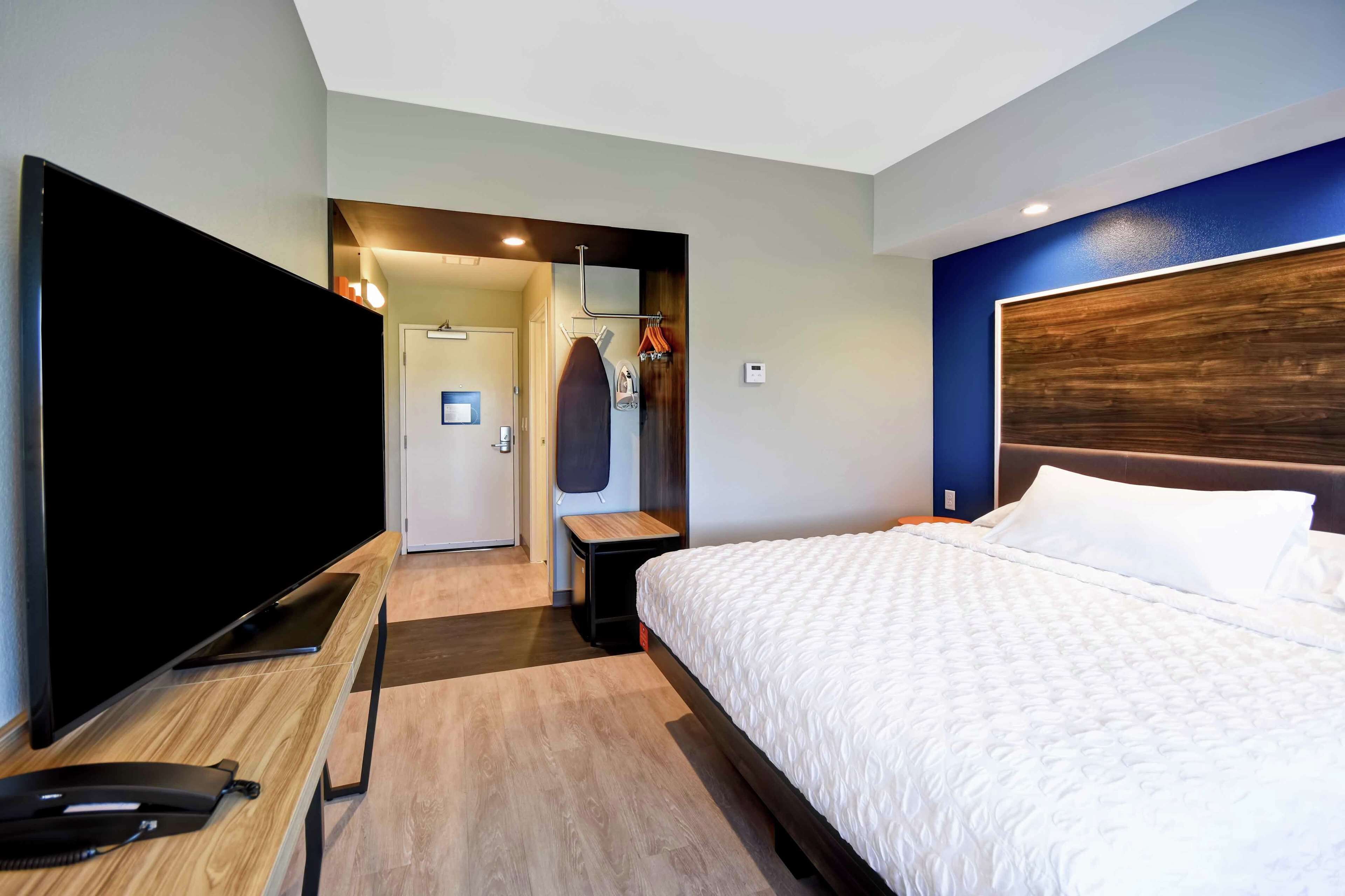 premium bedding, pillow-top beds, desk, blackout curtains