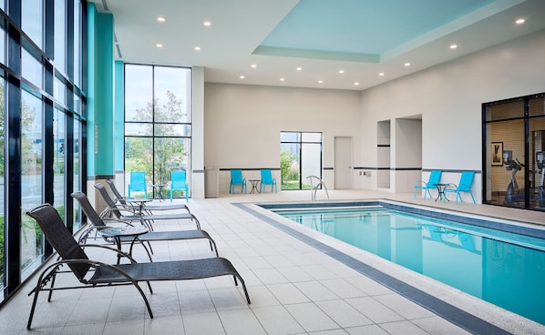 Indoor pool, open 7:00 AM to 11:00 PM, pool loungers