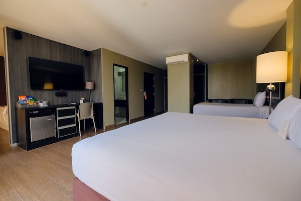Premium bedding, pillow-top beds, minibar, desk